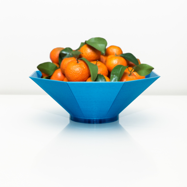 Image of a 3D printed fruit bowl filled with mandarines